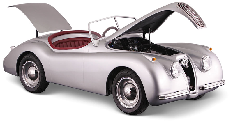Illustration for article titled A Tiny Drivable Jaguar Replica Might Be the Perfect Car For Big City Commutes